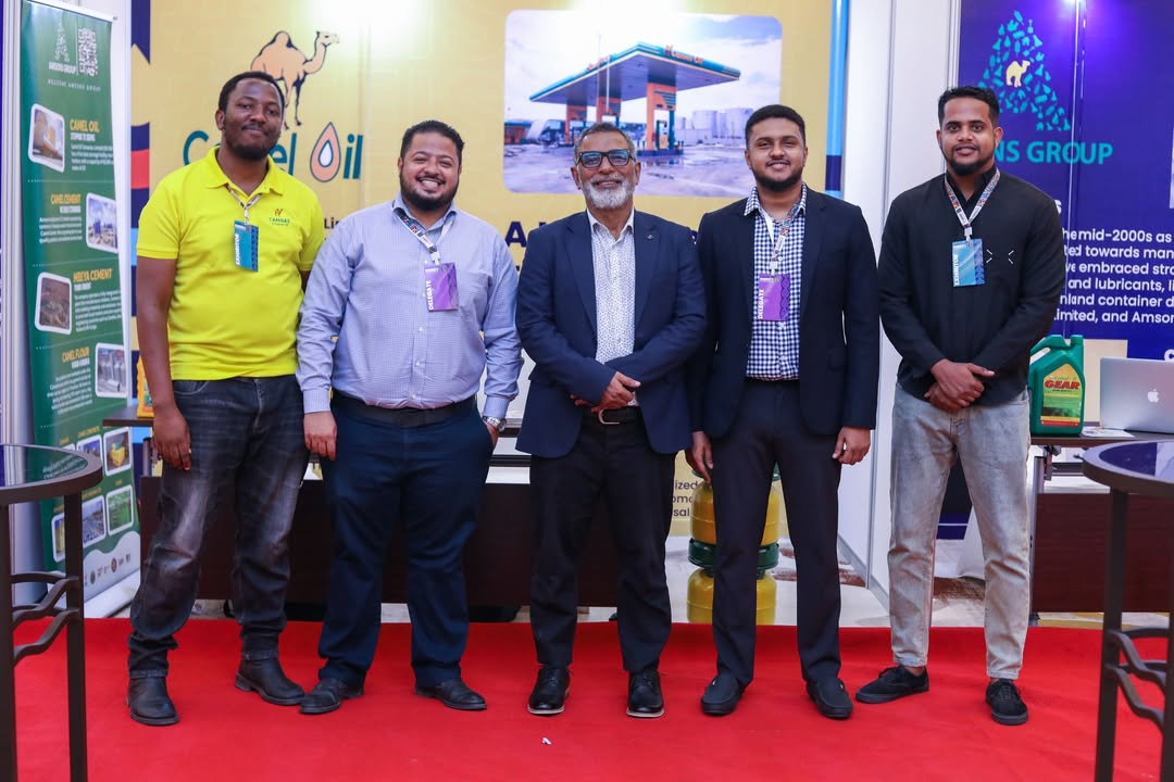 Camel Oil team at the exhibition booth showcasing products and services